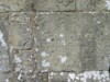 cross inscribed on exterior wall